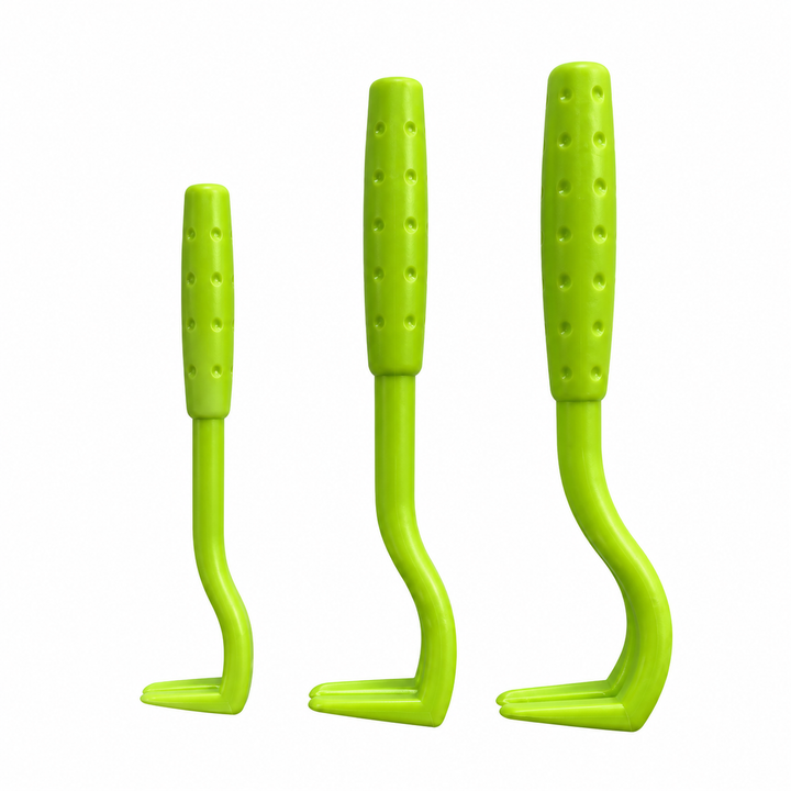 Three green WaggieKit tick removal tweezers